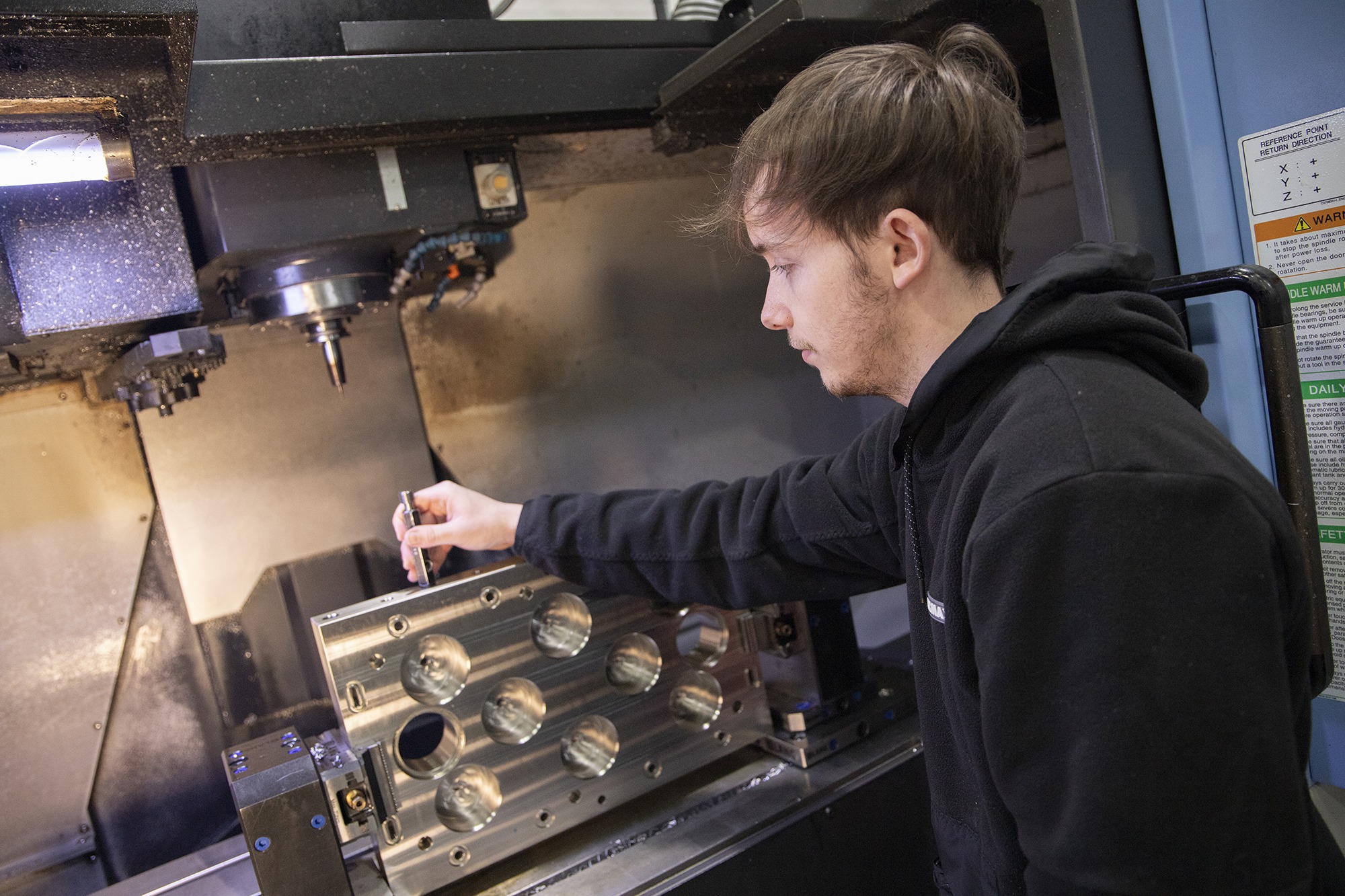 Technoturn employee operating machinery